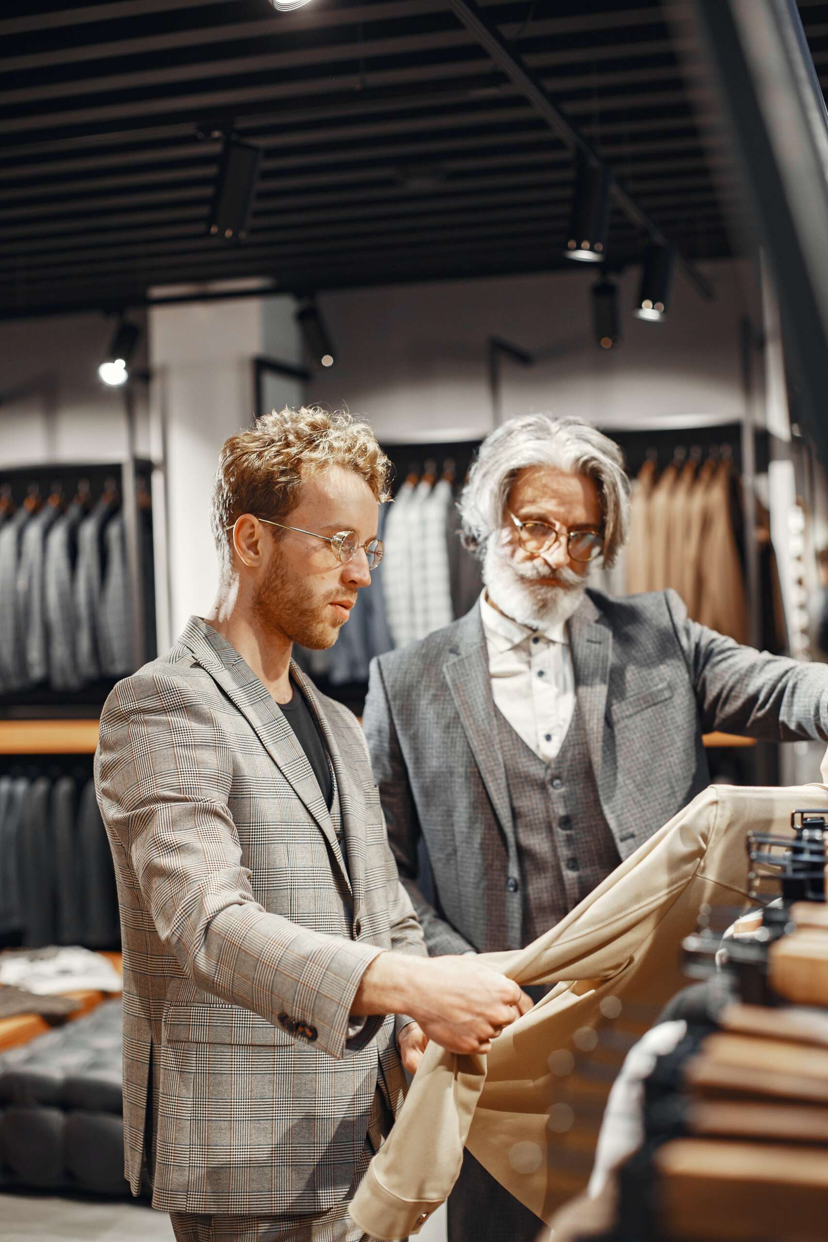2 men choosing an Outfit, the clothing store uses iPos Retail POS